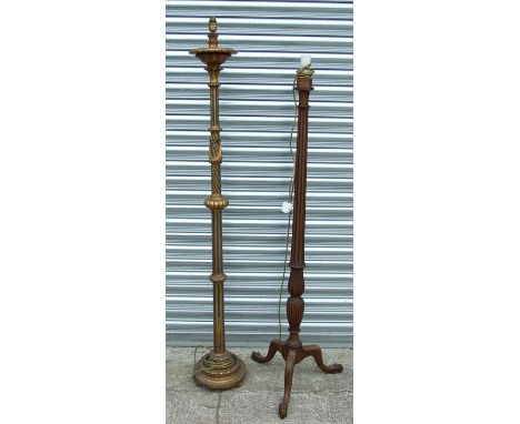A gilt gesso standard lamp; together with a mahogany standard lamp on tripod base with ball and claw feet (2).