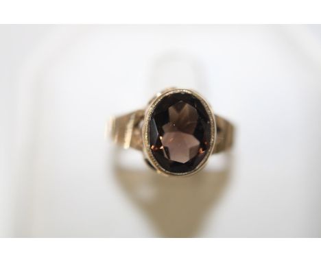 A 9ct gold smokey quartz ring size K 1/2 