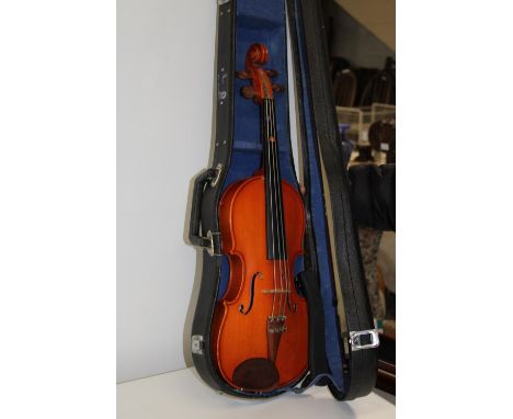 A cased violin &amp; bow 