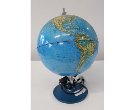 A vintage light up World globe 