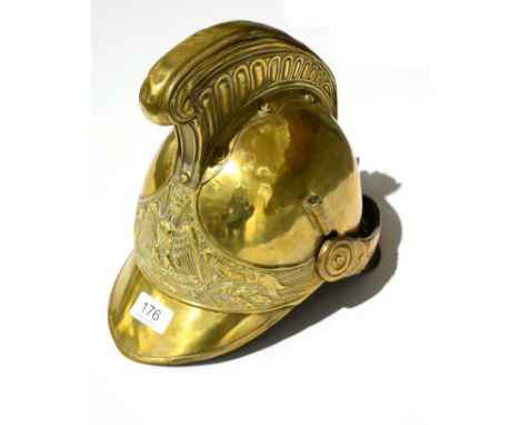 French Brass Fire Helmet 19th Century From Vron Fire Service with crest to front, original metal chin strap and raised comb (