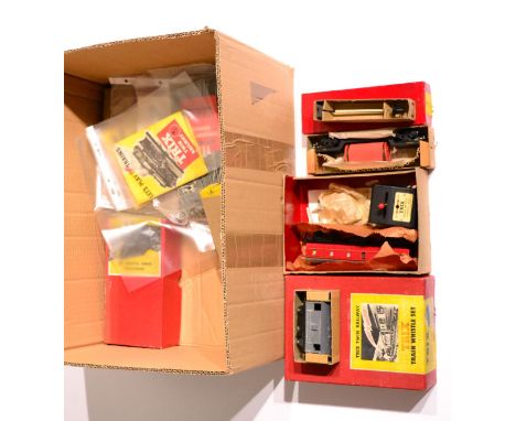 Trix Twin Railway Accessories including Operating dump wagon set, Train whistle set, Buffer stop on rail, Block signalling se