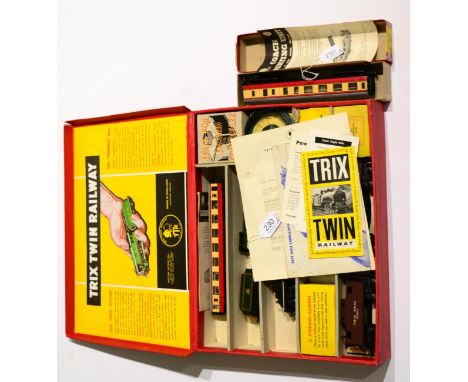 Trix Twin Railway Set Boxed containing US Outline 0-4-0 tender locomotive 3747, Box car, Open wagon and Caboose; Pytchley loc