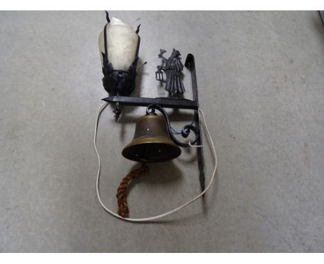 Cast Iron Bracket holding a Brass Bell, a Wall Light with Glass Shade and a Metal Town Crier