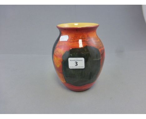 A decorative Poole pottery vase, printed marks  