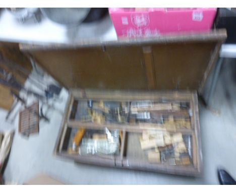 A vintage pine coffer, with various tools