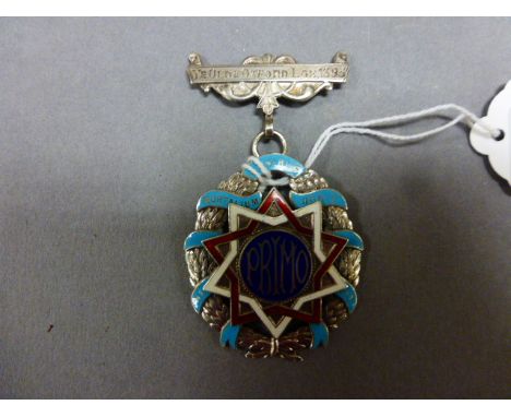 A silver and enamel Masonic badge