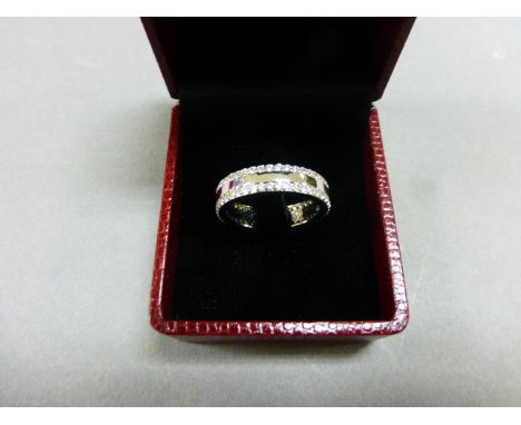 A silver and cz set ring