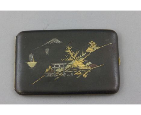 A Japanese K24 cigarette case decorated with Mt Fuji, signed