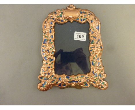 A copper and enamel set Art Nouveau style easel back picture frame