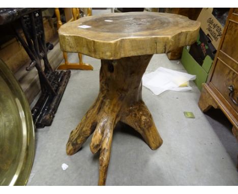A modern stool formed from a tree trunk 