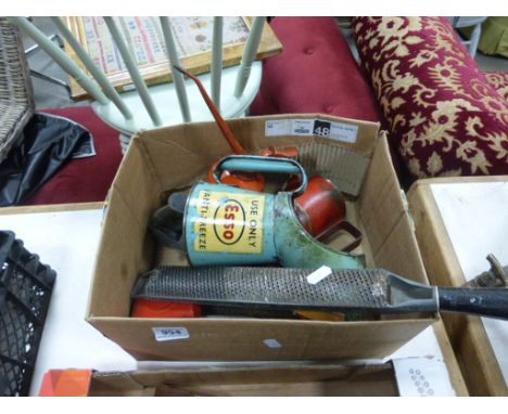 An Esso vintage oil can, along other items 