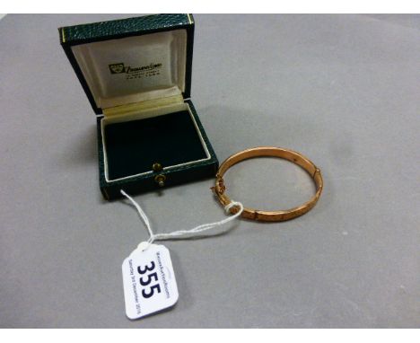 A 9 carat gold bangle 