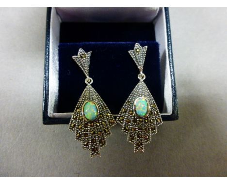 Pair of silver, marcasite, and opal drop earrings