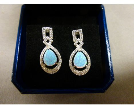 Pair of silver, cz, and opal drop earrings