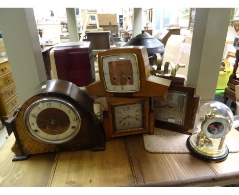 Four cased mantel clocks and one other clock