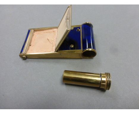 Vintage boxed enamel musical compact with built in lipstick