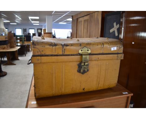 A vintage tin travel trunk of small proportions , width approx. 53cm