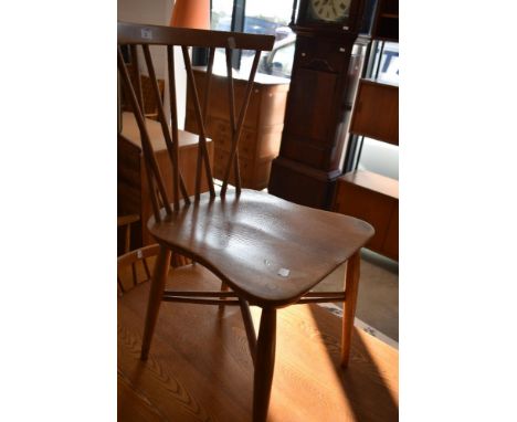 A set of four vintage Ercol 'candlestick' kitchen chairs