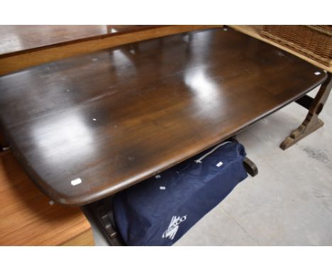 A dark Ercol refectory style dining table, approx. 152 x 85cm
