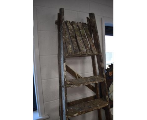 A set of wooden step ladders