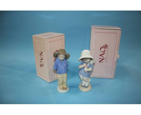 Two Nao figures, boxed