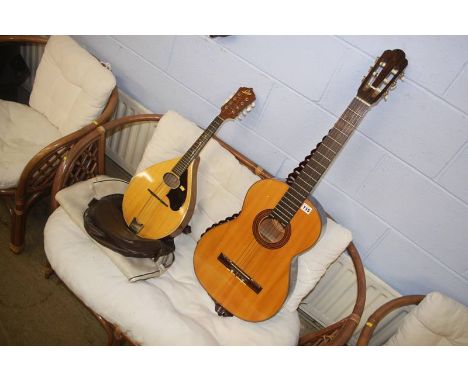 An Ibanez guitar and a  Levin of Sweeden mandolin model 158 (with soft case)