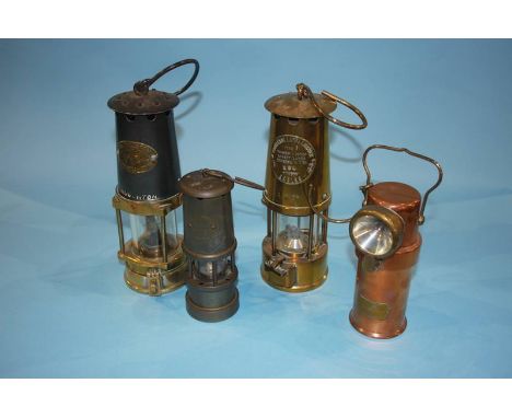 A Mills Miners lamp, an Eccles and two other lamps (4)