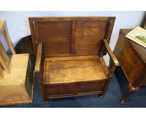 An oak monks bench