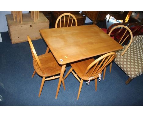 An Ercol Golden Dawn table and four hoop back chairs