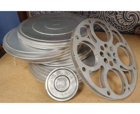 Original 16mm Film Camera aluminium film cans containing spools, together with a spare spool and small 8mm can