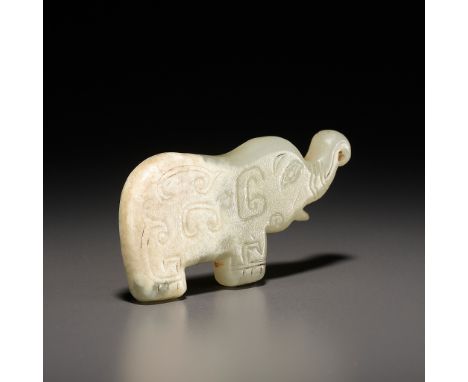 A JADE 'ELEPHANT' PENDANT, LATE SHANG DYNASTY, ANYANG PHASEChina, 13th-11th century BC. Thick flattened jade plaque, finely c