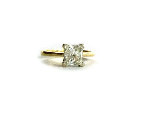 DIAMOND SOLITAIRE RINGset with a princess cut diamond of approximately 1.20 carats, marked 750, size J 1/2, 3.7g, the diamond
