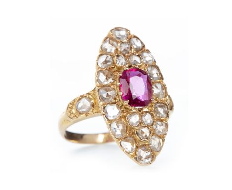 IMPRESSIVE RUBY AND DIAMOND DRESS RINGthe marquise shaped bezel set with a central cushion cut ruby of approximately 1.00 car