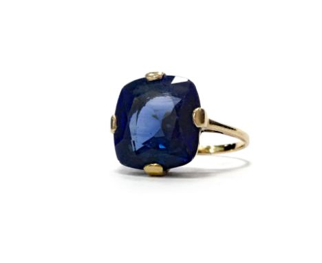 CREATED SAPPHIRE DRESS RING set with a large cushion cut created sapphire 10.5mm wide, marks worn, size L, 3.2g