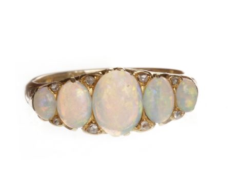 VICTORIAN EIGHTEEN CARAT GOLD OPAL AND DIAMOND RINGset with five large graduated oval opals, the largest, 7.7mm long, the sma