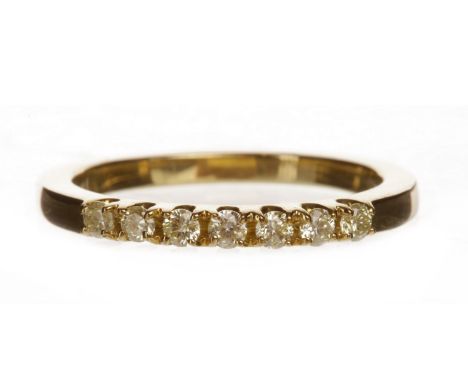 DIAMOND SEVEN STONE RINGset with round brilliant cut diamonds approximately 0.30 carats each, marked 375, size L 1/2, 2.1g   