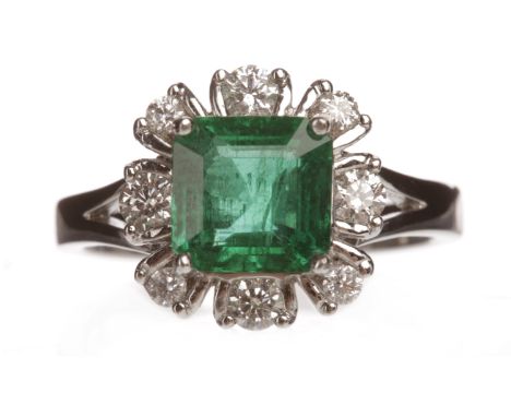 EMERALD AND DIAMOND RINGset with a central square step cut emerald of approximately 1.50 carats surrounded by round brilliant