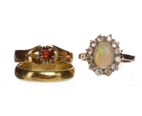 OPAL AND WHITE GEM SET RINGunmarked, size O, 3g; along with an eighteen carat gold wedding band, size M, 3.7g and a red gem s