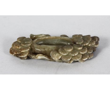 A CARVED JADE BRUSH WASHER. 5ins long.