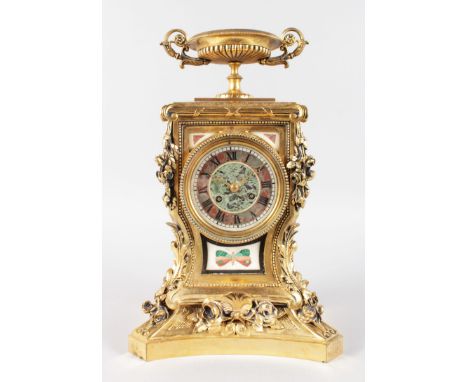 A SUPERB LOUIS XVI ORMOLU AND PIETRA DURA MANTLE CLOCK, with eight-day movement striking on a single bell, with urn finial, a