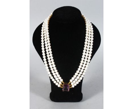 A SILVER, GOLD PLATED AND PEARL NECKLACE, set with a large baguette cut amethyst.