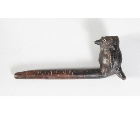 A PRE-COLUMBIAN PIPE, modelled as a bird. 6.5ins long.