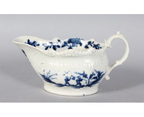 A GOOD WORCESTER 18TH CENTURY CREAM BOAT, painted with two men on one side and flowers on the other, in blue and white large 