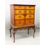 AN 18TH CENTURY STYLE WALNUT CHEST ON LATER STAND, with moulded cornice, two short and three long