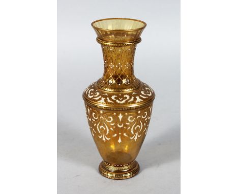 A MOSER AMBER GLASS VASE with enamel decoration. Signed.  7ins high.