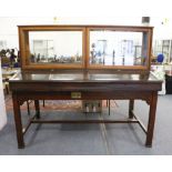 A VICTORIAN OAK SHOP FITTING, with a central glazed upper section, sloping display units either