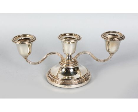 A SILVER SQUARE CANDLESTICK, 4ins high, Birmingham 1962.