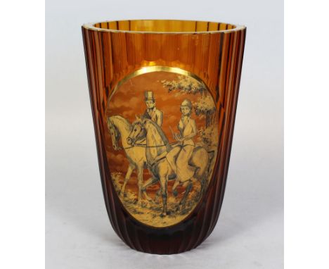 A FRENCH GLASS VASE, with a large oval scene of horse riding. 8ins high.