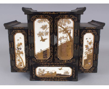 A GOOD QUALITY JAPANESE MEIJI PERIOD LACQUERED WOOD & SHIBAYAMA IVORY CABINET, the doors and drawer inset with ivory panels d